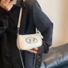 Pas cher en gros liquidation limitée 50% de réduction sac à main nouveau à la mode petit sac Fort mignon femmes été populaire une épaule carré