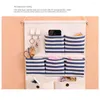 Sacs de rangement Sac suspendu au mur Simple coton et placard multifonction 8 poches pochettes en tissu de lin garde-robe