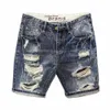 Mens rippade denimshorts fashionabla sommarskortbyxor med oroliga rippade designhål koreansk stil kort jeans man 240313
