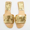 Sandaler sommaren 2024 Kvinnor Flat Slippers Gold Criss-Cross Leather Slides Casual Woman Flip Flops Kvinnliga strandskor