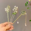 Hårklipp retro kinesisk stilklämma Långt tasselblomma Hårnål för flickor handgjorda stick kvinnor hanfu tillbehör