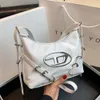 Barato por atacado folga limitada 50% desconto bolsa hobo saco sier axilas feminino high-end sentimento picante estilo menina jingle ombro versátil