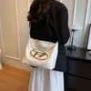 Pas cher en gros liquidation limitée 50% de réduction sac à main petit sac fourre-tout de banlieue Sier femmes Millennium Girl Dingdang Premium mode une épaule sous les bras sac à main