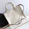 Högkvalitativ designer tygväska tygbemannar handväskor kvinnor herr enkla avslappnade axlar shopping väskor 240318