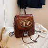 Pas cher en gros liquidation limitée 50% de réduction sac à main compte mode nouveau mignon Cowboy fille sac à dos étudiant petite foule livre sac