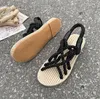 HBP icke-märke Nya handgjorda damer Casual Beach Sandaler skor Cross Straps Hemp Rope Flat Roman Sandals For Women