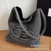 Pas cher en gros liquidation limitée 50% de réduction sac à main denim sac à fesses femme nouvelle mode aisselles petite taille grande capacité une épaule seau