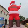 Partihandel gratis fartyg utomhusspel aktiviteter 12m 40ft lång jätte uppblåsbar jultomten med LED -ljus juldekoration Santa