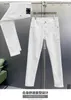 Jeans da uomo firmati Luce di lusso Qualità Autunno e inverno Slim Fit Elastico di fascia alta Versatile Nero Bianco Pantaloni a gamba dritta per tutte le stagioni 7X8Z