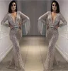 Sparkly Silver Prom Dresses Bling Bling Sequined Mermaid aftonklänningar Deep V Neck Långa ärmar med Tassel Arabic Formal Party DR9171619