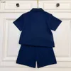 Märke barnkläder baby tracksuits broderade logotyp pojkar t-shirt set storlek 110-160 cm sommar designer polo skjorta och shorts 24mar