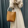 Cordon Lichee modèle doux peau de vache fourre-tout unique sac à bandoulière femmes minimalisme grande capacité seau mode Calssic banlieue sac à main