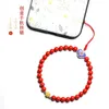 Strand Red Lucky Cinnaber Mobiele telefoon hangende decoratie Ruyi Pols Shell Lanyard Chain Voorkom verlies Groothandel Tas Dames