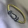 Lyxiga smycken Fredy Armband Nytt titanstål Inlagd Black Diamond Leather Rope Horseshoe 8-formad inlagd diamantfärgarmband med samma smyckestil