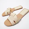 Sandaler sommaren 2024 Kvinnor Flat Slippers Gold Criss-Cross Leather Slides Casual Woman Flip Flops Kvinnliga strandskor