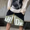 Rhude Shorts Sommer amerikanische Quad-Hosen Designer-Shorts Lockere, schnell trocknende Bewegung Basketballhosen und Laufhosen Lässige Shorts mit Monogrammdruck Herrenshorts