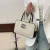 Goedkope groothandel Beperkte opruiming 50% korting Handtas Prachtig linnen Paulin Ball Bag Mode verpakt met decoratieve Veelzijdige handschoen Crossbody Eén schouder