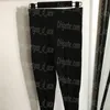 Pantalones de diseñador de lujo para mujer, mallas elásticas negras, pantalones de tubo adelgazantes, pantalones de pierna escalonada de cintura alta