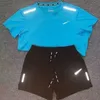 Nouveau chaud designer hommes survêtement hommes femmes à manches courtes survêtement mode tendance luxe imprimé t-shirt shorts ensemble deux pièces.