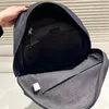 Sac de voyage classique unisexe décontracté en denim avec une très bonne taille de dos de 30 * 40 cm, sac à dos tendance de la rue, grand sac à bandoulière pour étudiants de créateurs, sac à dos de loisirs