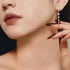 Pendientes de tuerca versión coreana S925 plata pura femenina con diseño de borla con incrustaciones de circón accesorio versátil