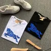 Tees Mens Designers T Shirt Man Womens Tshirts z literami Drukuj krótkie rękawy Lvity Letnie koszule Mężczyźni luźne koszulki azjatyckie rozmiar s-xxxxxl 7630
