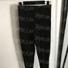 Pantalones de diseñador de lujo para mujer, mallas elásticas negras, pantalones de tubo adelgazantes, pantalones de pierna escalonada de cintura alta