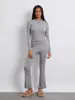 Kvinnors T-skjortor Kvinnor Två stycken Flare Pants Set Crew Neck Crop Top och fold-Over Low Rise Ribbed Slim Lounge Sets Tracksuit