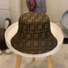 Lüks Brim Hats Designer Mens Tasarımcıları Kova Gezmiş Sun Hat Beyzbol Kapakları Seyahat İçin