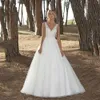 Plus Size V Neck A Line Wedding Dresses Romantic Tulle Lace Appliqued Boho Rustic Country Bridal Gowns Sweep Train Open Back Sexy Bride Women Robes de Mariee