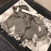 Hoge Taille Kwastje Gebroken Denim Shorts Vrouwen Zomer Koreaanse Versie Ruwe Rand Wijde Pijpen Losse Plus Size Jean Shorts Vrouwelijke 240319