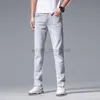 Men's Jeans Designer Jeans for men spring/summer new light gray slim fit high-end casual pants man