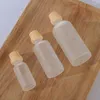 Garrafas 5pcs 5-100ml Tubos de garrafa foscos de madeira tampa de vidro recarregável para frascos de recipientes essenciais