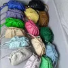 Şık omuz çantaları dokuma tasarımcı çanta tote bulut çantası deri bir çapraz elle taşınan manyetik düğme hamur tatlısı 240311