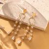 Boucles d'oreilles pendantes créatives pour femmes, Imitation de perles, goutte d'eau, à la mode, longues pampilles, bijoux, vente en gros, directe