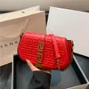 Il designer di marca di fabbrica vende borse da donna con uno sconto del 50% Borsa da donna online Primavera e sella a tracolla con catena di moda popolare