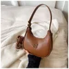 Pas cher en gros liquidation limitée 50% de réduction sac à main avancé nouveau sac de lune femmes cette mode polyvalente sous les bras Dumpling unique épaule Wtern style bandoulière