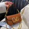 Sacs de vente en gros design de conception de boutique 2024 Spring Nouvelle mode haut de gamme simple Sac à épaule des femmes sous les bras