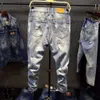 Männer zeigen im Frühling und Sommer eine Gewichtsabnahme.Neue trendige Marke Beggar's 9/4 Loose Hole Denim-Hose in hellen Farben