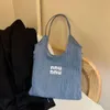 Pas cher en gros liquidation limitée 50% de réduction sac à main petit et tendance sac à bandoulière pour femmes nouvelle fille polyvalente épaule sous les bras capacité transport fourre-tout