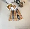 2024 Sommer Mädchen Plaid Kleider Kinder Marine Revers Weste Plissee Kleid Designer Kinder Baumwolle Gitter Kleidung S1228