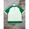 24SS CASABLANCA Knapp POLOS MEN DESIGNER TRE PEARL Knappar Grön vit block Polo Shirt Casablanc