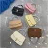 High End the R w Handbag T-shaped Buckle Cowhide Handbag Sofia Premium Texture Tofu Bag 240315