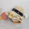 夏のストロー織りバケツ帽子女性豪華な休暇漁師帽子屋外通気文字プリントサンハット