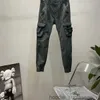 2024 Mannen en vrouwen Stones Patches Vintage Cargo Broek Designer Grote Zak Vrije tijd sportbroek Track modemerk Legging Lange heren Sport BTA3U