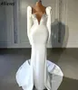Sexy plongeant V couche de sirène robes de mariée magnifiques manches longues de perles dubaï robes nuptiales arabes avec train vintage boho satin élégant de mariee yd