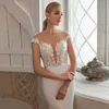 Eleganckie sukienki ślubne syreny 2024 Koronkowe aplikacje CAP rękawy iluzja