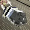 Kvinnors shorts solid coloe denim kvinnor 2024 sommar hög midja casual kvinna grundläggande lösa breda lge korta byxor f13