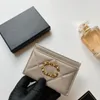 Titulaires de cartes en cuir de mode pour hommes Porte-monnaie Lady Luxury Designer Mini portefeuille de cartes Porte-clés Portefeuille Femmes Top Qualité Embrayage Noir Petits détenteurs de passeport Pochette clé