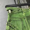 Gonne di jeans verdi stile europeo Minigonna asimmetrica a vita doppia personalizzata alla moda per donna